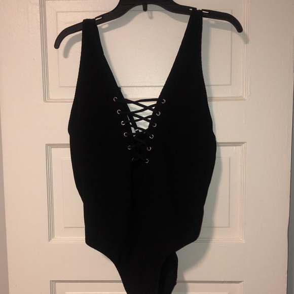 Never worn black once piece bathing suit. - Picture 6 of 6